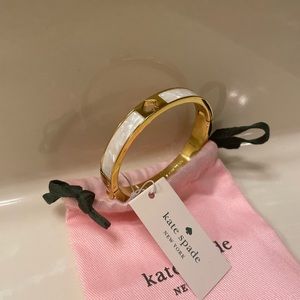 Kate spade bracelet gold/pearl color